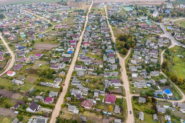 Panoramic aerial view of private development with country houses or village