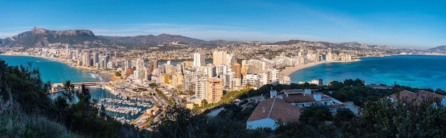 Panoramic on the ascent to the Penon de Ifach Natural Park in the city of Calpe Valencia Valencian Community Spain Mediterranean sea Cantal Roig Beach La Fossa Beach and Las Salinas