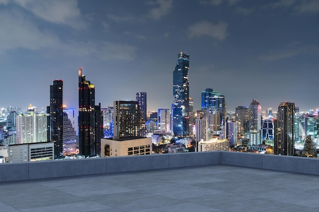 Panoramic bangkok skyline view concrete observatory deck on\
rooftop night time asian corporate and residential lifestyle\
financial city downtown real estate product display mockup empty\
roof