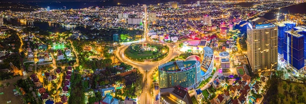 Panoramic coastal Vung Tau view from above with traffic roundabout house Vietnam war memorial in Vietnam Long exposure photography at night