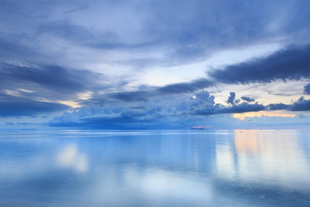 Panoramic dramatic tropical sunset sky and sea at dusk