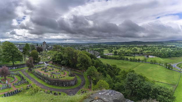 Panoramic image of scenery from Stirling Castle viewing The Church of the Holy Rude and Old Town Cemetery in Stirling Scotland