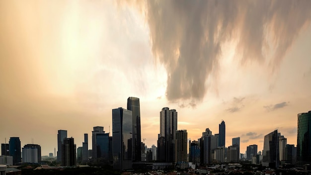 Photo panoramic jakarta skyline with urban skyscrapers in the afternoon