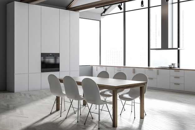 Panoramic kitchen corner with white countertops, a cooker, a wooden floor and a long wooden table with chairs. 3d rendering mock up