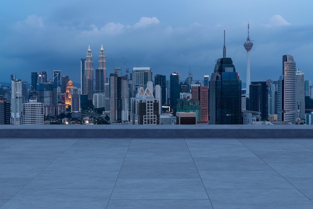 Panoramic Kuala Lumpur skyline view concrete observatory deck on rooftop night Asian corporate and residential lifestyle Financial city downtown real estate Product display mockup empty roof