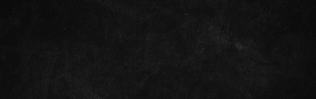 パノラマの怖い暗い壁の背景にわずかに明るい黒のコンクリートセメントテクスチャ