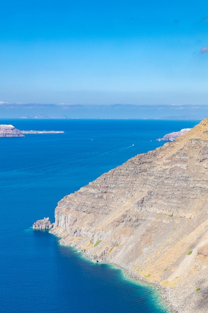 Panoramic sea view Santorini caldera cliffs from on Santorini island, Greece. Travel bay landscape