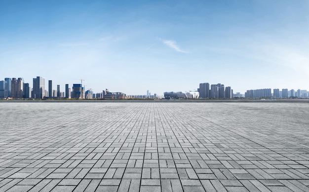 Panoramic skyline and buildings with empty concrete square floor, Qianjiang New Town