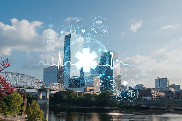 Panoramic skyline view of Broadway district of Nashville over Cumberland River at day time Tennessee USA Hologram healthcare digital medicine icons The concept of treatment from disease