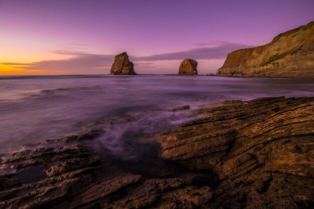 Panoramic in Two Sisters of Hendaye with the purple sky. France