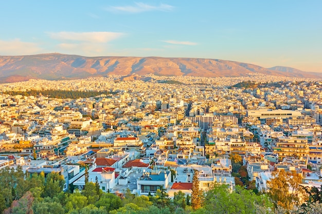 Панорамный вид города Афины на закате, Греция