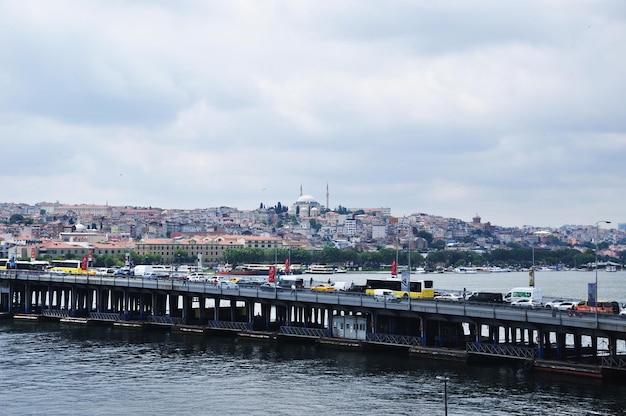 Panoramic view of the bridge over the Golden Horn. Movement across the bridge. 09 July 2021, Istanbul, Turkey