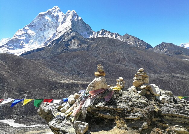 Panoramic view of buddha statue against mountain range