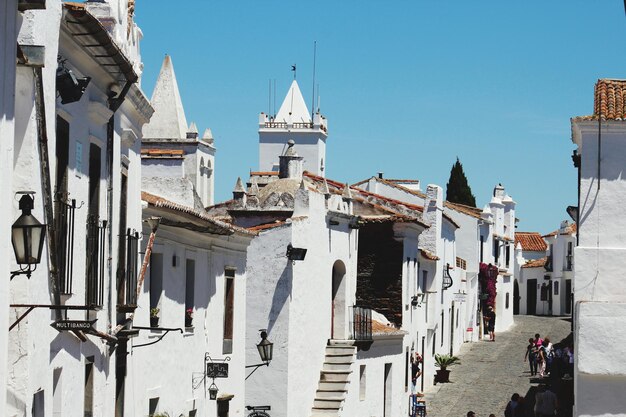 Panoramic view of buildings in city against clear sky