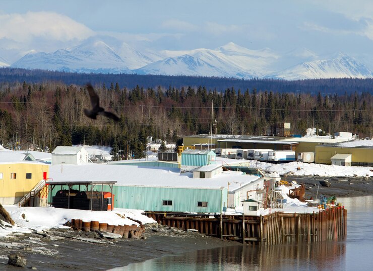 Photo panoramic view of buildings and snowcapped mountains against sky