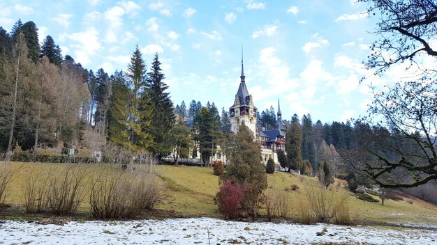 Panoramic view of castle against cloudy sky