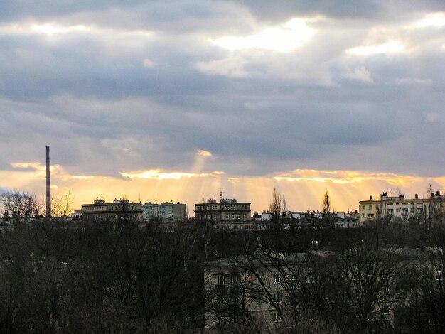 Photo panoramic view of city against sky during sunset