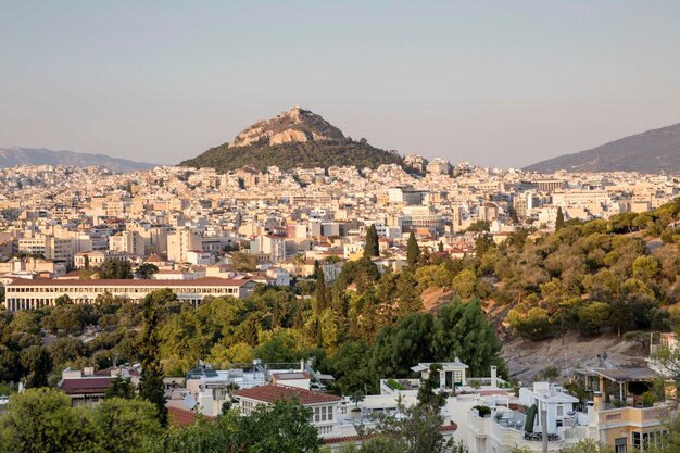 Panoramic view of the city of Athens Old Agora and Lecavitos hill in the evening Greece