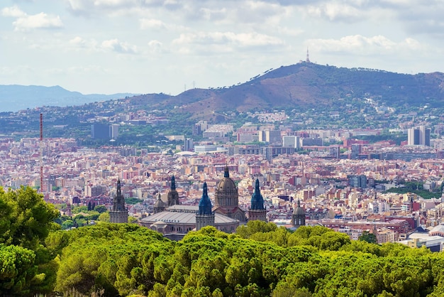 Panoramic view of the city of Barcelona with its buildings huddled next to the hills surrounding the city Spain