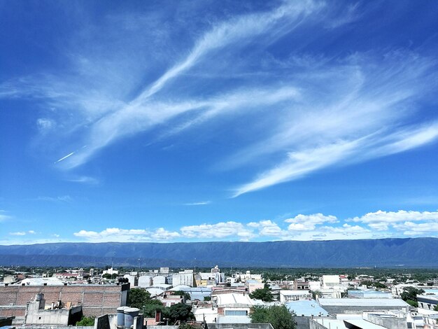 Photo panoramic view of cityscape against blue sky