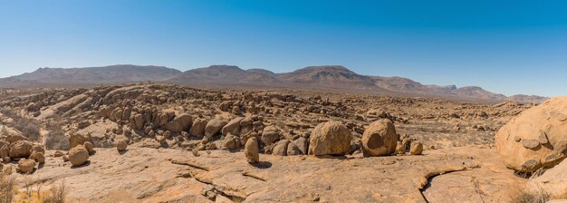 Panoramic view of desert against sky