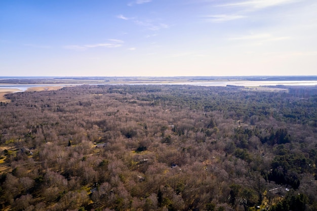 Panoramic view of the Eastcost of Kattegat Jutland close to Mariager fjord Denmark Natural landscape with sparse vegetation and the horizon in the view Seasons changing from winter to spring