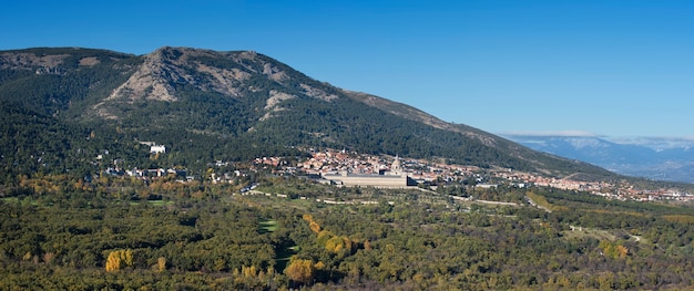 Panoramic view of El escorial village and Guadarrama mountains