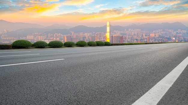 Panoramic view of empty road in city