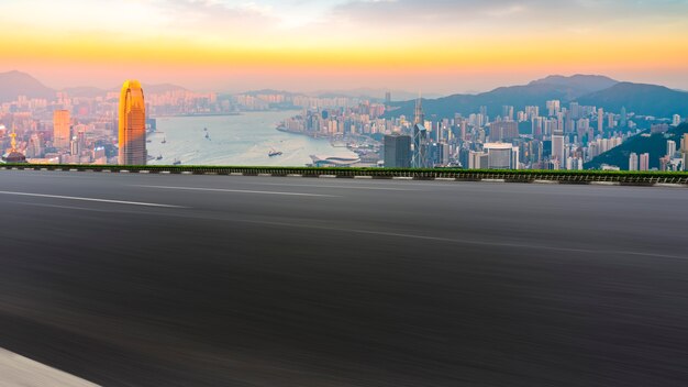 Panoramic view of empty road in city