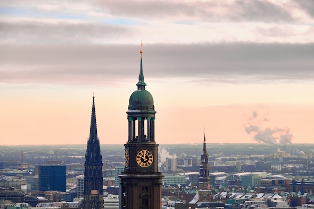 Panoramic view from Dancing Towers over Hamburg under snow on a misty day in winter