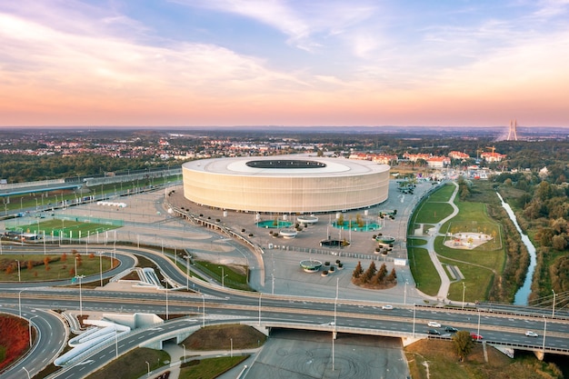 Panoramic view from the top to wroclaw city, wroclaw city\
stadium at sunset, poland