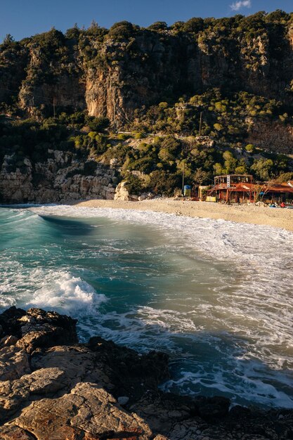 Photo panoramic view of great pebble beach in kas lykian coast turkey