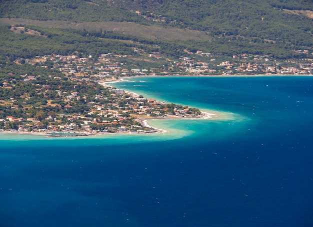 Panoramic view of the greek village and beautiful psatha beach in corinthian gulf in greece