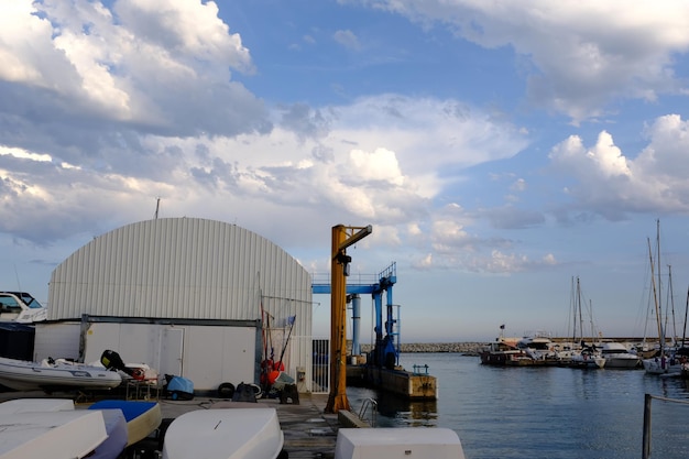 Panoramic view of harbor against sky