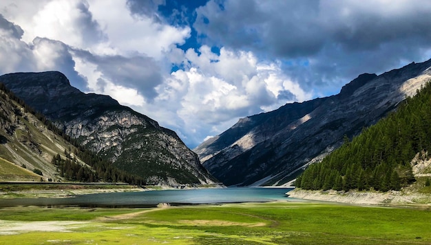 Panoramic view of lake and mountains against sky