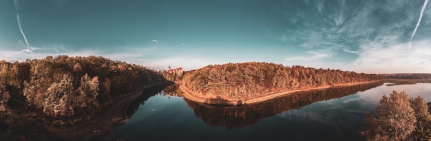 Photo panoramic view of lake and trees against sky