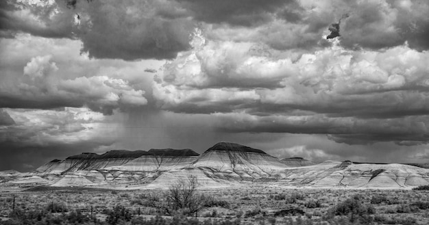 Photo panoramic view of landscape against cloudy sky