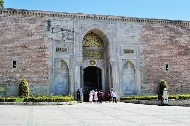 Panoramic view of the large fortress wall. Entrance gate to the territory of the main palace of the Ottoman Empire until the middle of the 19th century. July 09, 2021, Istanbul, Turkey.