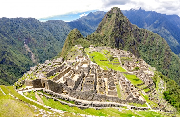 Panoramic view of Machu Picchu lost city at archaeological ruins site in Peru