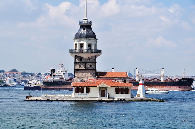 Panoramic view of the Maiden Island and the ship sailing along the Bosphorus. July 10, 2021, Istanbul, Turkey.