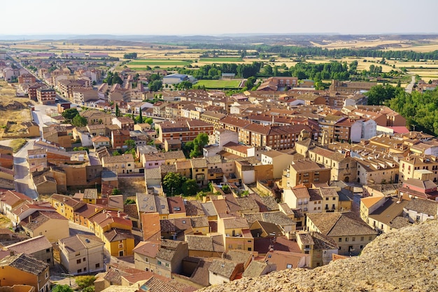 Panoramic view of the medieval village of San Esteban de Gormaz at dawn on a summer day