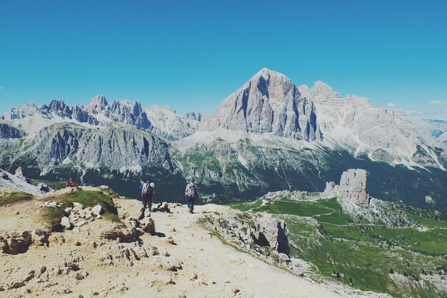 panoramic view of mountains against clear blue sky