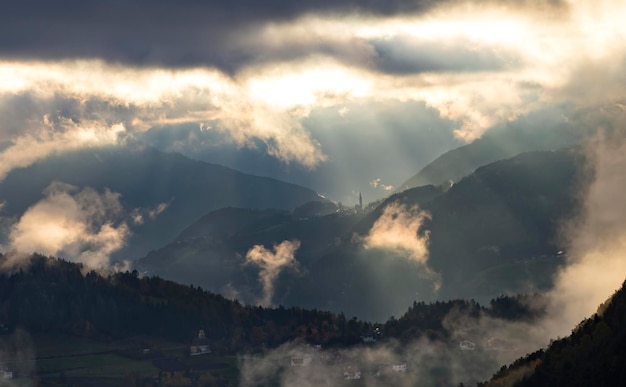 Panoramic view of mountains against cloudy sky