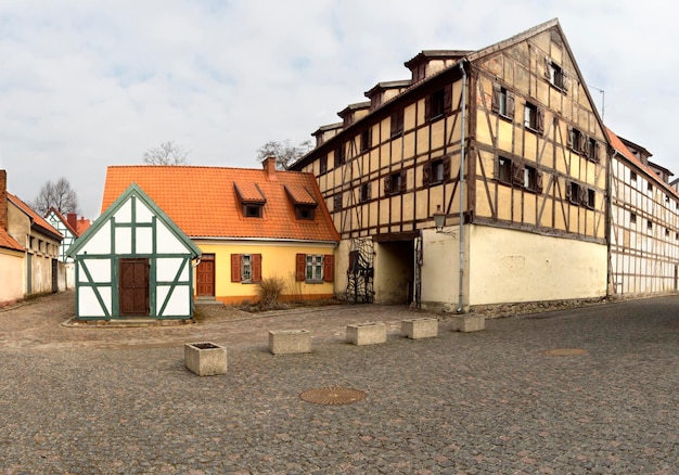 Panoramic view Old houses in the paved street of the Old Town of Klaipeda Lithuania