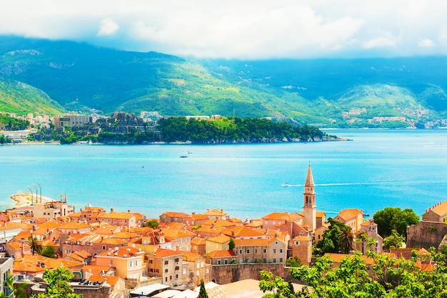 Panoramic view of Old town and sea coast in Budva, Montenegro. Famous resort at Adriatic sea. Beautiful summer landscape.