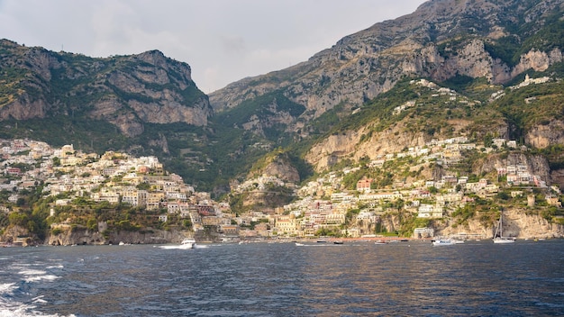 Panoramic view of Positano town in afternoon sun