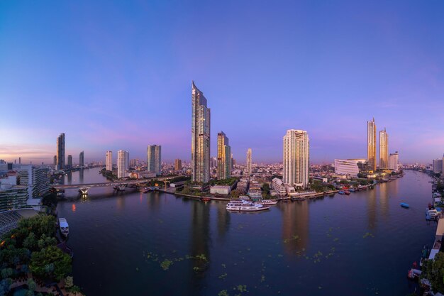 Panoramic view of river and buildings against sky