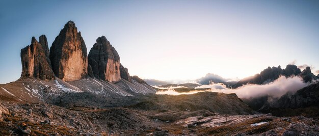 Panoramic view of rock formations against sky during sunset