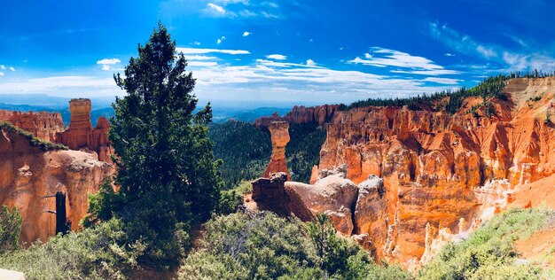 Panoramic view of rock formations against sky