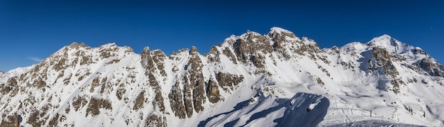 Panoramic view of rocky mountains peaks in Tetnuldi ski resort Svaneti region of Georgia